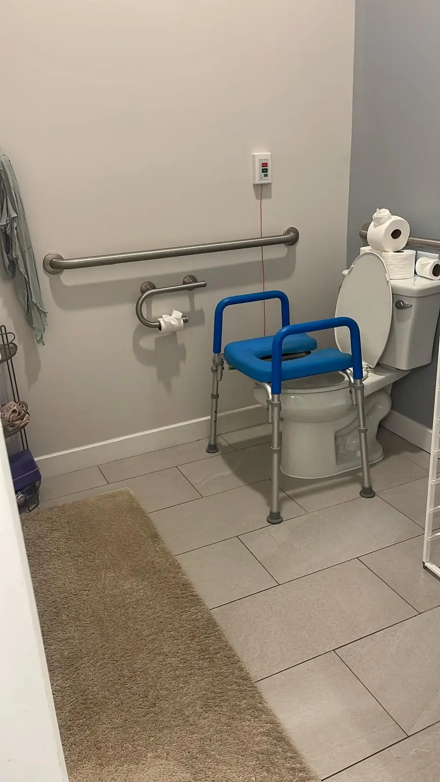 Clean accessible bathroom with grab bars after a house cleaning in Clinton, MA