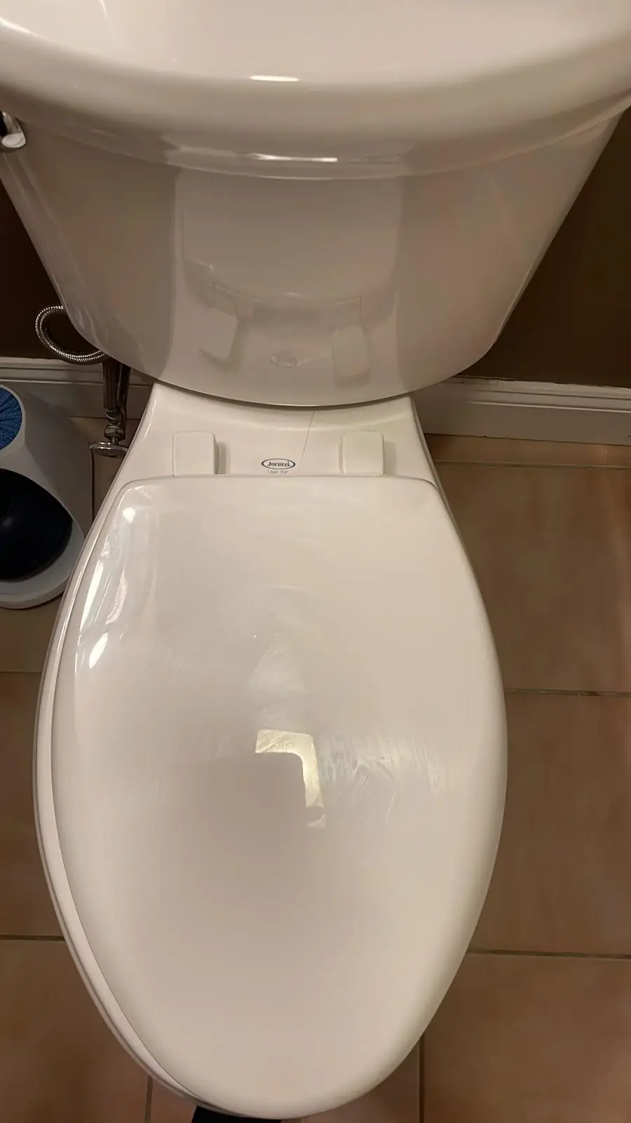 Clean toilet and surrounding fixtures after a deep cleaning in Clinton, MA